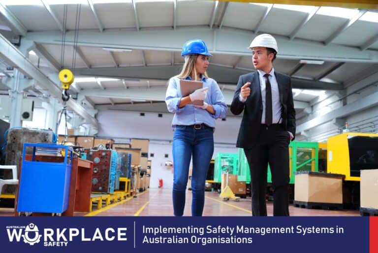 two professionals wearing safety hats inside the workplace